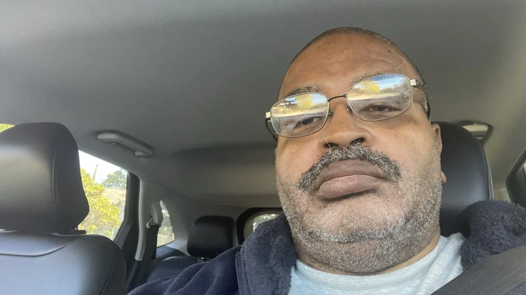 Joe Wize sitting in his car and thinking about his next creative move